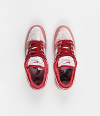 Nike SB 'Strangelove' Dunk Low Pro Shoes - Bright Melon / Gym Red - Medium Soft Pink thumbnail